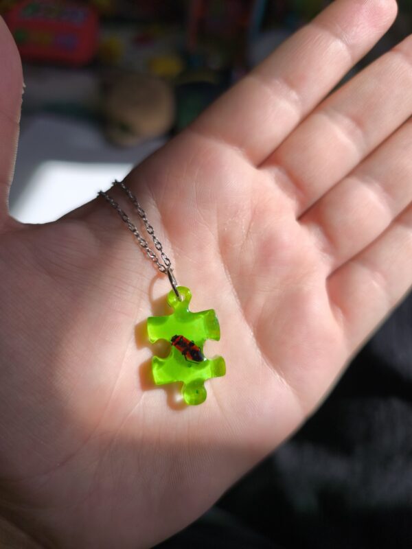 2025/09/1000003772-scaled.jpg Firebug Glow necklace